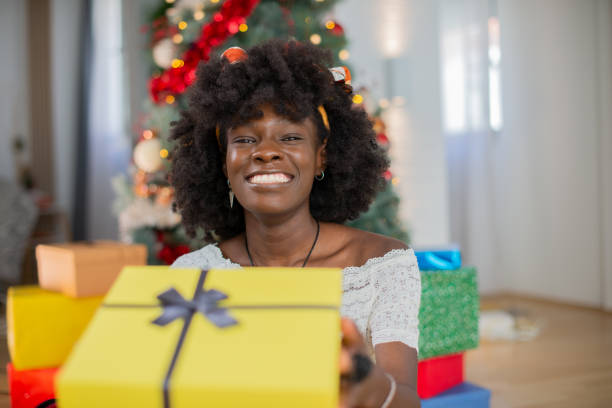 istock Happy woman celebrating Christmas 1432058757