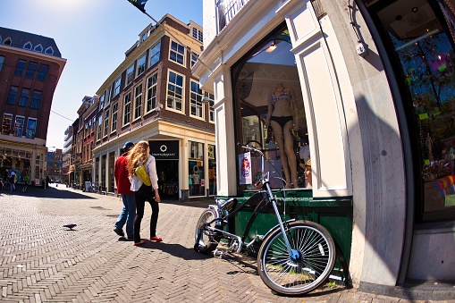 The Hague, Netherlands june 02 2009 : - One of the small historic shopping streets in the netherlands with people walking