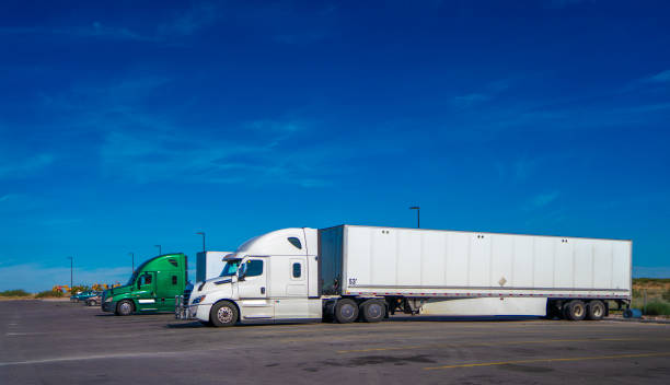 istock Two Semi trucks parked on a resting station in Texas 1432059637