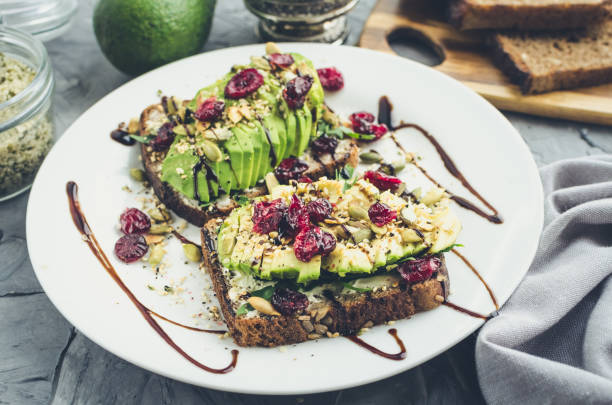 istock Healthy avocado toasts for breakfast or lunch with rye bread 1432059757