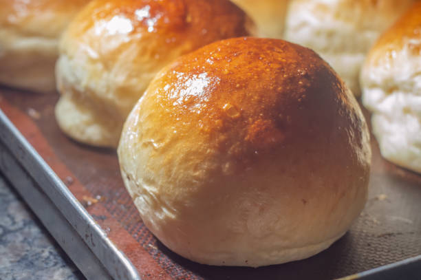 istock Homemade Sweet Brioche Hamburger Buns, texture with various brioche breads 1432063173