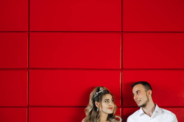 istock stylish groom with bride in wedding dress. 1432065588