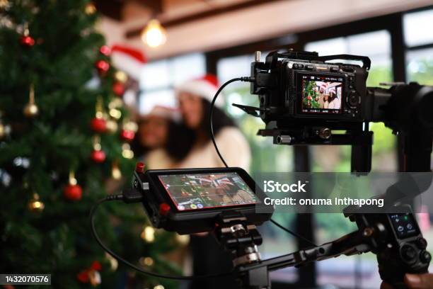 Professional Vloger Shooting Christmas Celebration At Home Stock Photo - Download Image Now