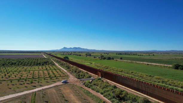 istock Fence along the border U.S.-Mexico, Drone shot 1432080951
