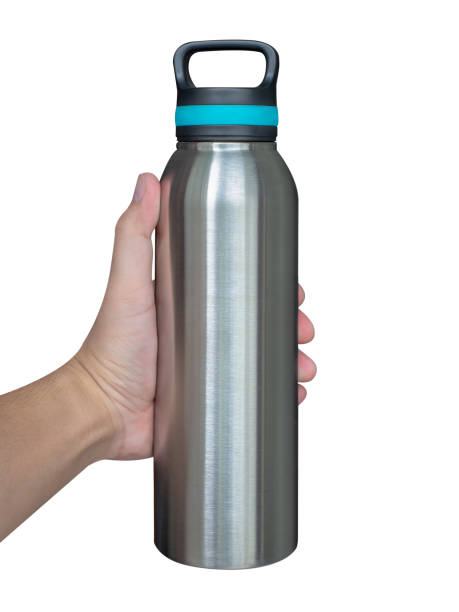istock Hand holding a stainless bottle isolated on white background. 1432082646