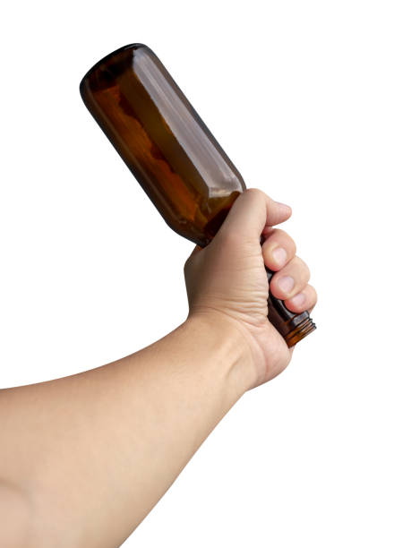 istock Male hand holding beer bottle isolated on white background 1432083304