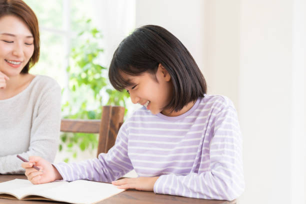 istock asian mother and daughter who study 1432085015