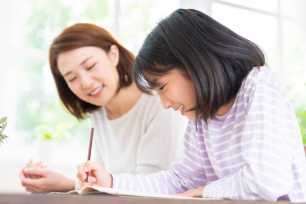 istock asian mother and daughter who study 1432085750