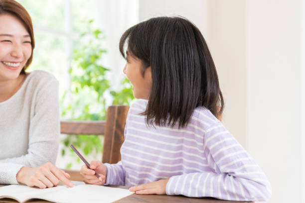 istock asian mother and daughter who study 1432085968