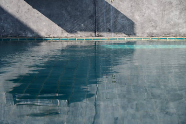 istock blue swimming pool and cement wall, construction industry 1432091878