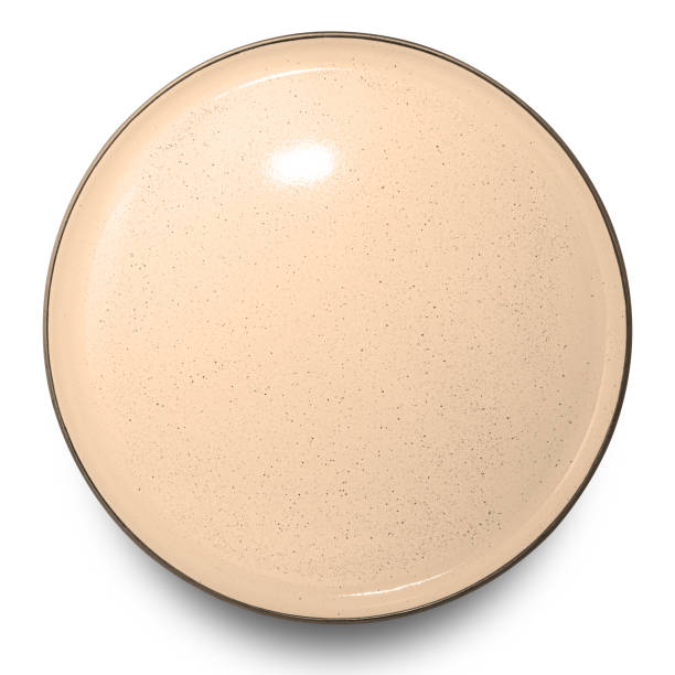 istock Brown circle ceramics plate isolated on white background. 1432098487