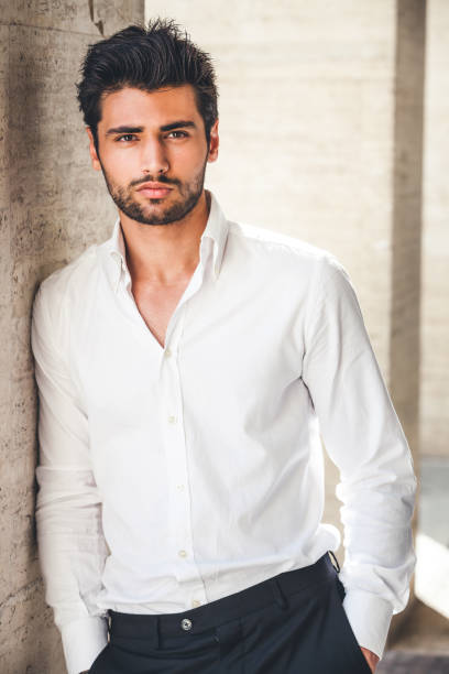 istock Handsome and stylish young man with white shirt 1432108140
