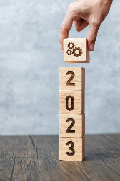 istock 2023 block with gear icon. Business Process, Team, teamwork, Goal, Target, Resolution, strategy, plan, Action, motivation, change, brainstorm and New Year start concepts 1432112801