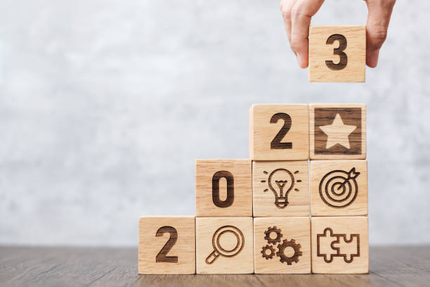 istock 2023 wood block with business success, goal, strategy, target, mission, action, objective, teamwork, plan, idea and New Year start concept 1432112880