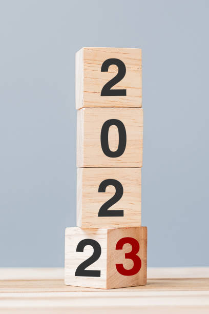 istock 2022 chang to 2023 wooden cube blocks on table background. Resolution, plan, review, goal, start, end year  and New Year holiday concepts 1432113356
