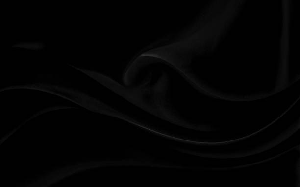 istock Black gray satin dark fabric texture luxurious shiny that is abstract silk cloth background with patterns soft waves blur beautiful. 1432113599