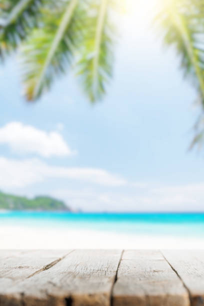 istock Empty wooden table or pier with sunny beach and sea 1432114784