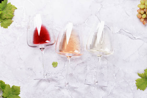istock White, rose and red wine glasses and grape 1432117515