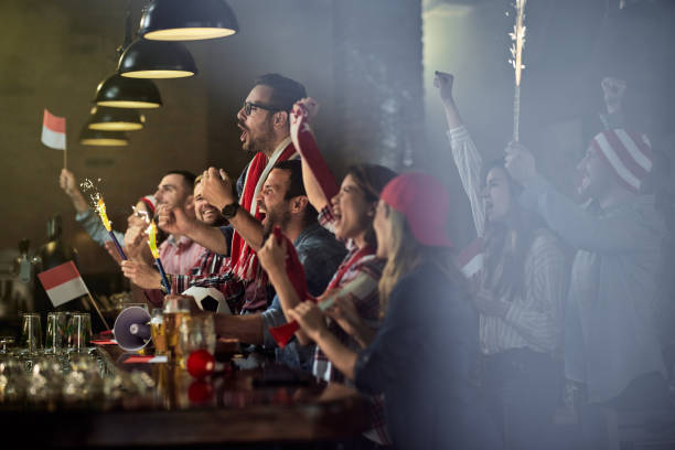 istock Cheering for sports team in a pub! 1432118692
