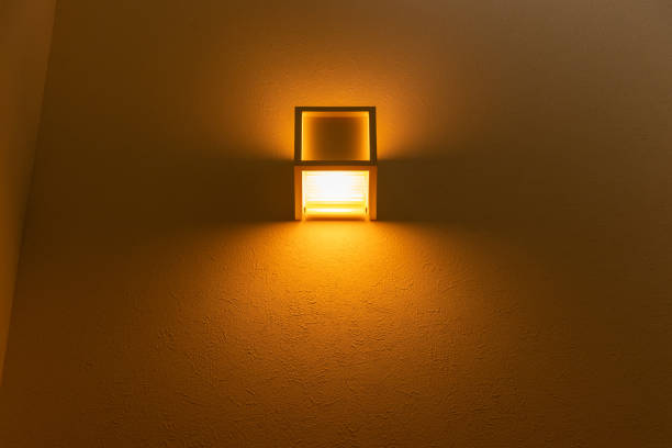istock Wall light fixture emitting orange color light 1432119969