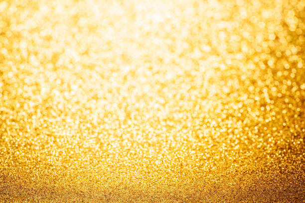 istock Gold Glitter Sparkle Confetti Background 1432126311