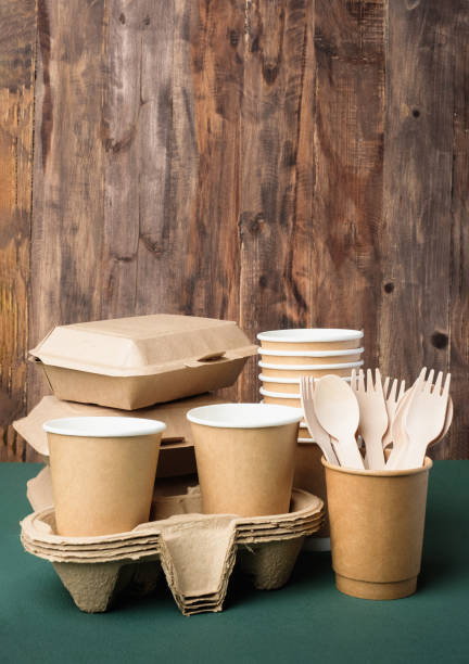 istock Eco friendly food ware,disposable cup ,food container, bamboo spoon fork on green table.sustainable 1432127700