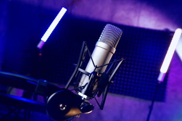 istock Close up of professional microphone in recording studio 1432129199