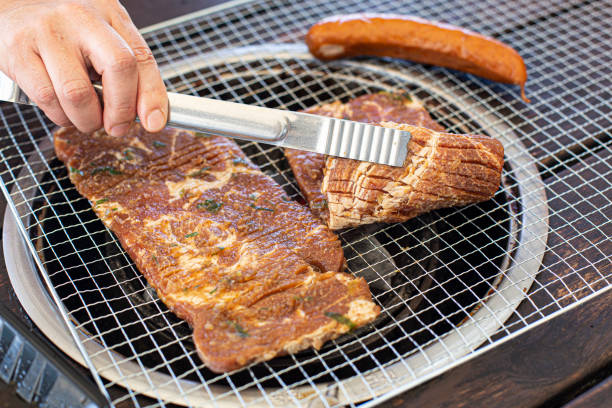 istock grilled ribs are grilled on charcoal. 1432132473