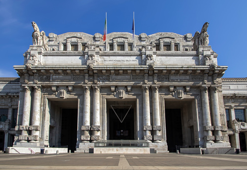 The entrance to Milano Centrale, the main railway station in Milan, Italy