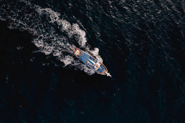 istock Bird Eye View Yacht Sailing in Waves 1432137876