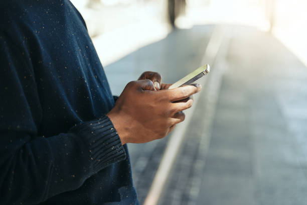 istock Hands, phone or networking on social media app, internet search or digital iot. Closeup black man with 5g communication technology planning schedule, writing email or using contact us page on website 1432140841