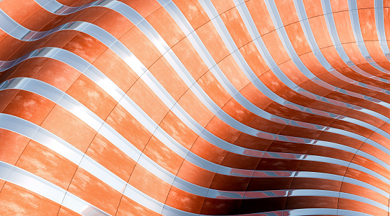 istock Curved architecture with striped surface forming waves 1432140902