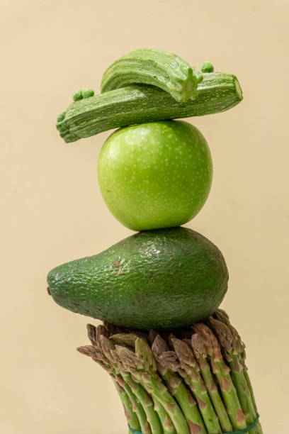 Green fruit and veggies in vertical equilibrium