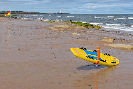 Pärnu, Estonia - July 11, 2021: Surfing equipment for rental at Aloha surf center on Pärnu beach.