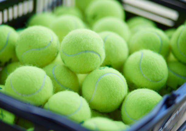istock Many tennis balls in a basket 1432153228