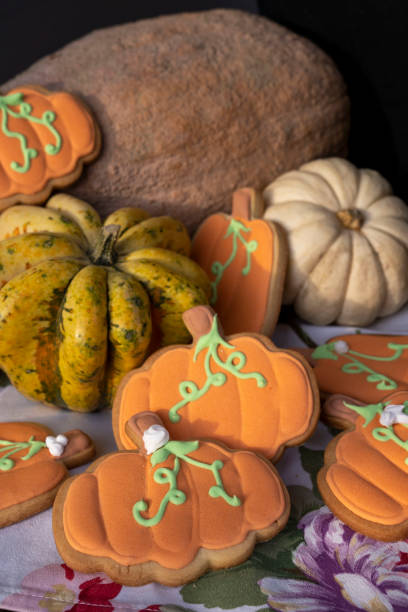 istock Pumpkin shaped decorated cookies with royal icing 1432153891