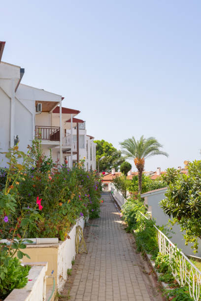 istock Narrow footpath among white houses. 1432156977