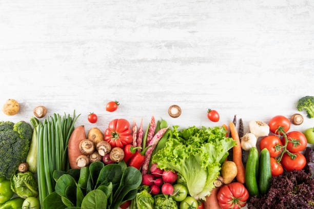 istock Fresh Vegetables on White Wooden Table 1432158669