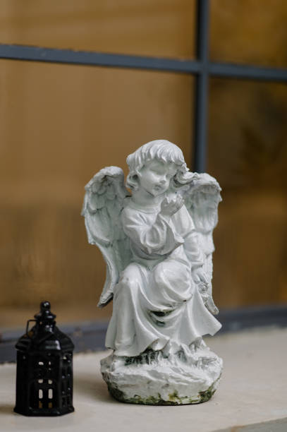 istock cupid of love statue isolated 1432160018