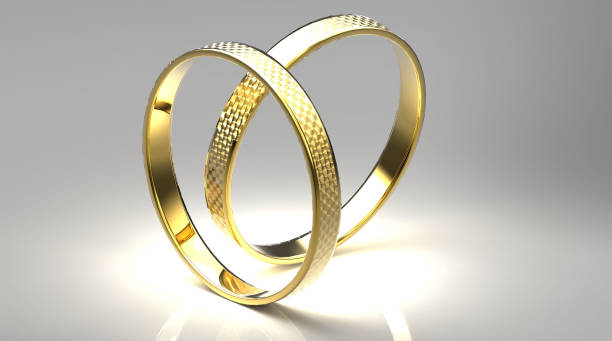 istock the  gold rings on a gray background 1432161340