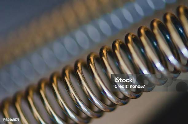 Metal Springs In Closeup Stock Photo - Download Image Now - Coiled Spring, Machinery, Abstract