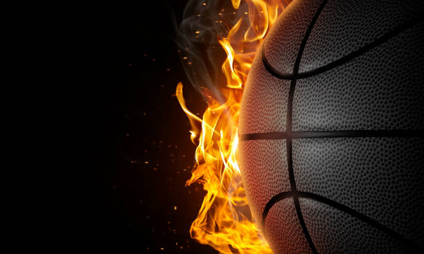 istock Basketball on fire on black background 1432175361