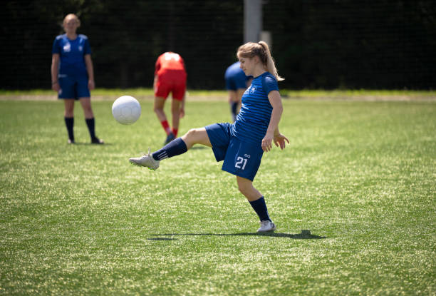 istock Football player practising on ground 1432175514