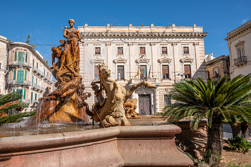 Syracuse, Italy - 09-16-2022: Piazza Archimede in Syracuse with the beautiful Diana Fountain