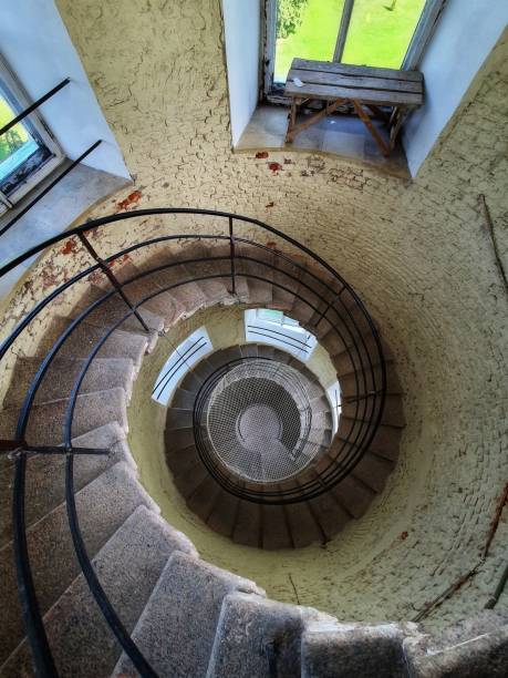 istock Shot from a top to a  circular staircase at an old building 1432181288