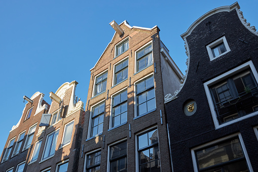 Canal houses facade in Amsterdam, The Netherlands