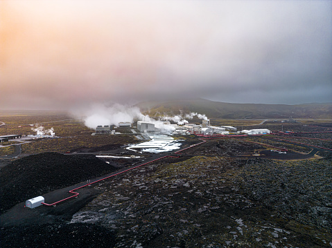 Svartsengi Geothermal Power Plant aerial view in foggy and cloudy weather producing energy harnessed from geothermal water in Iceland.