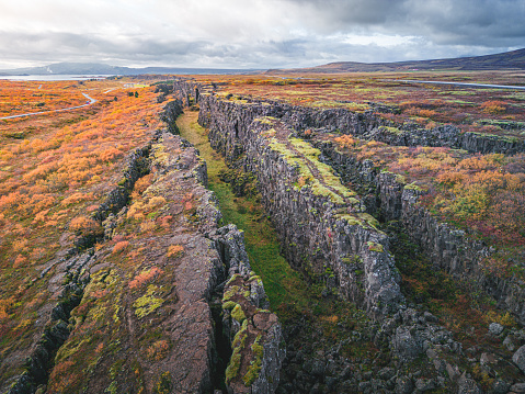 Thingvellir park lies in a rift valley that marks the crest of the Mid-Atlantic Ridge and the boundary between the North American and Eurasian tectonic plates. The only place on earth where you can see two tectonic plates colliding.