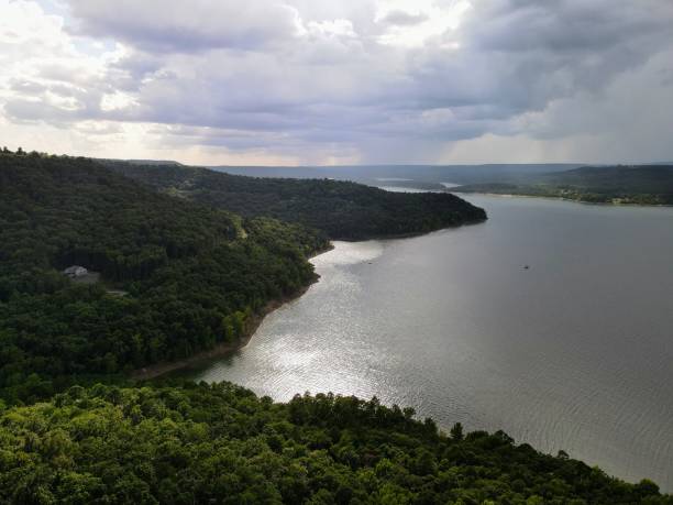istock High angle view of a lake surrounded by green vegetation 1432192131