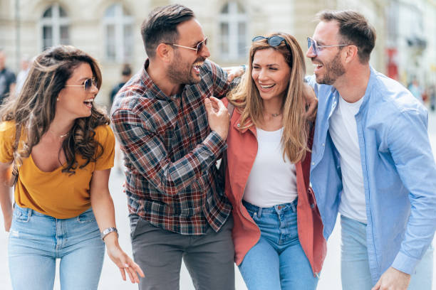 istock Friends having fun outdoors in the city 1432193053